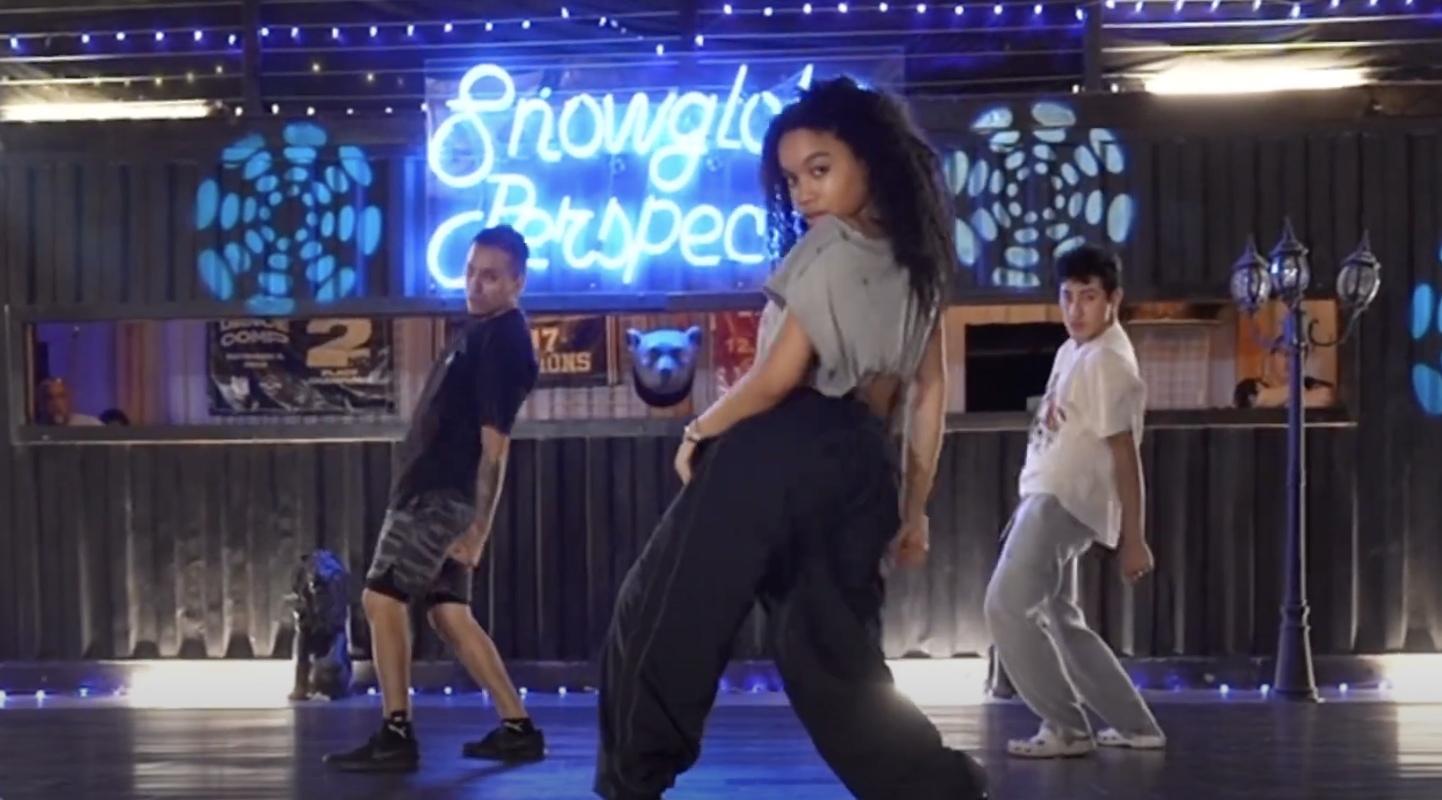 a woman in mid dance routine